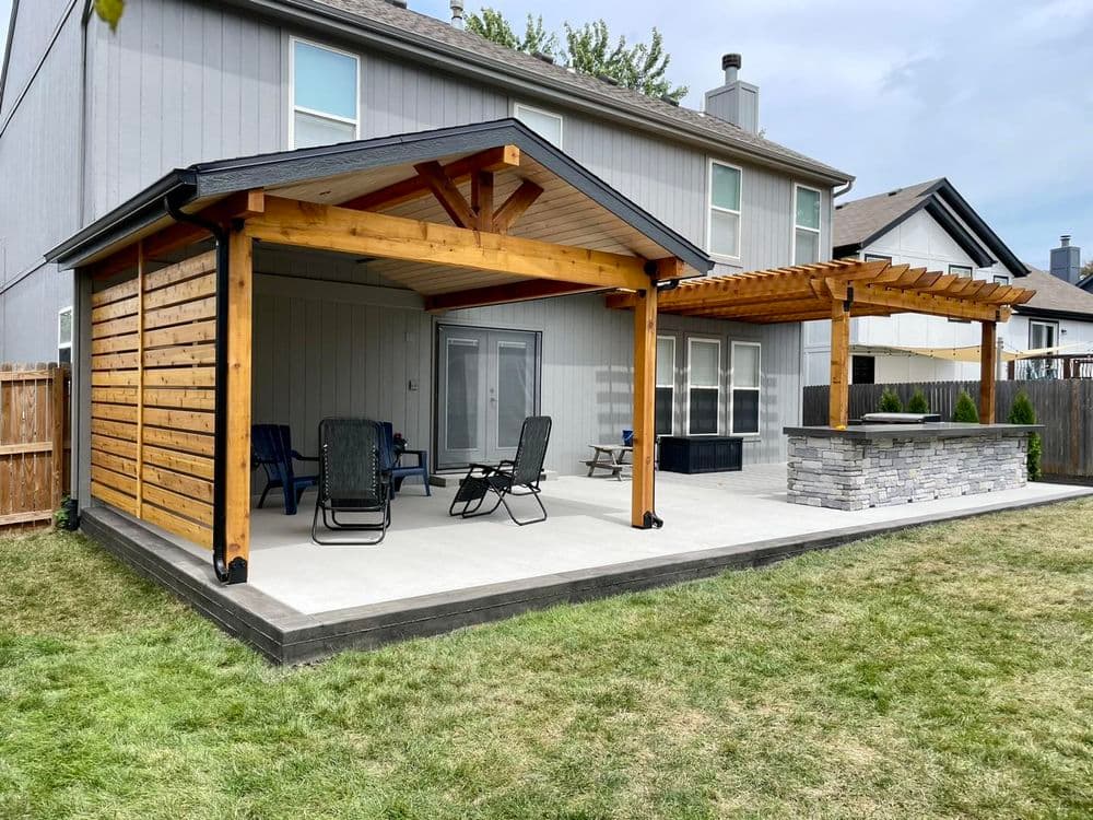Elegant Outdoor Living Space Featuring Concrete Patio and Pergola in Olathe