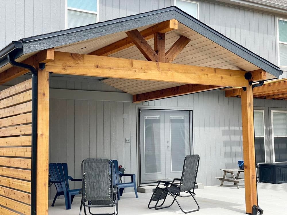 Gallery photos for Elegant Outdoor Living Space Featuring Concrete Patio and Pergola in Olathe: Image #7