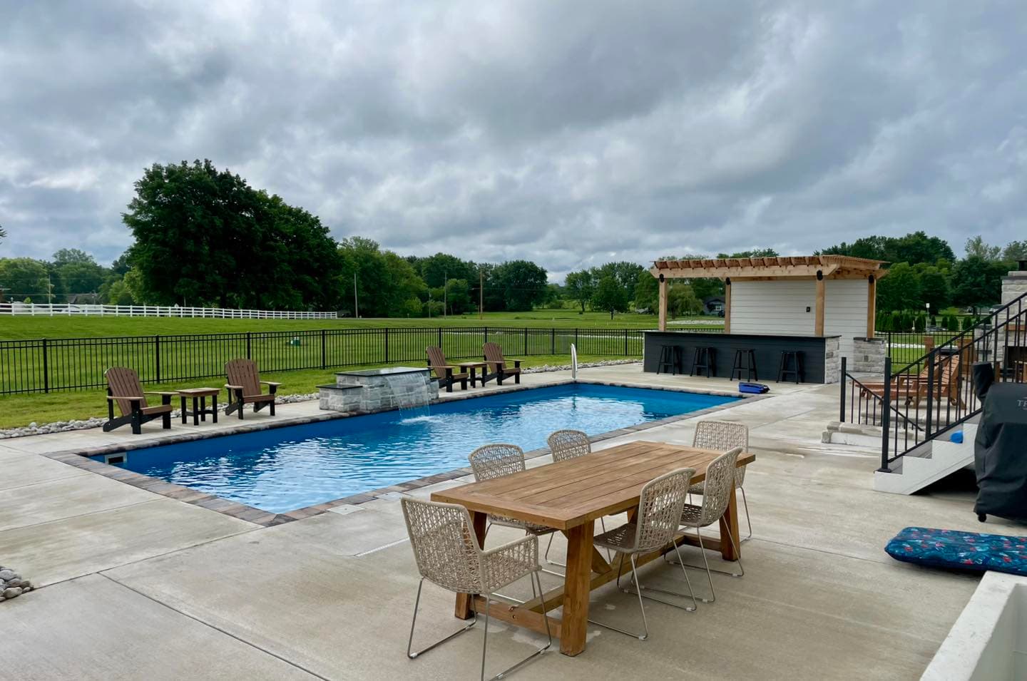 Fiberglass pool with waterfall